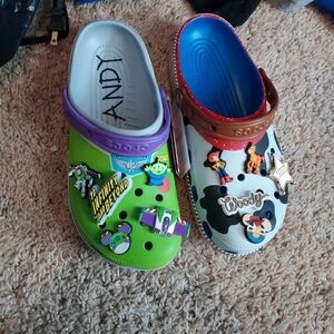 CROCS Green and White Sandals with Cartoon Accents